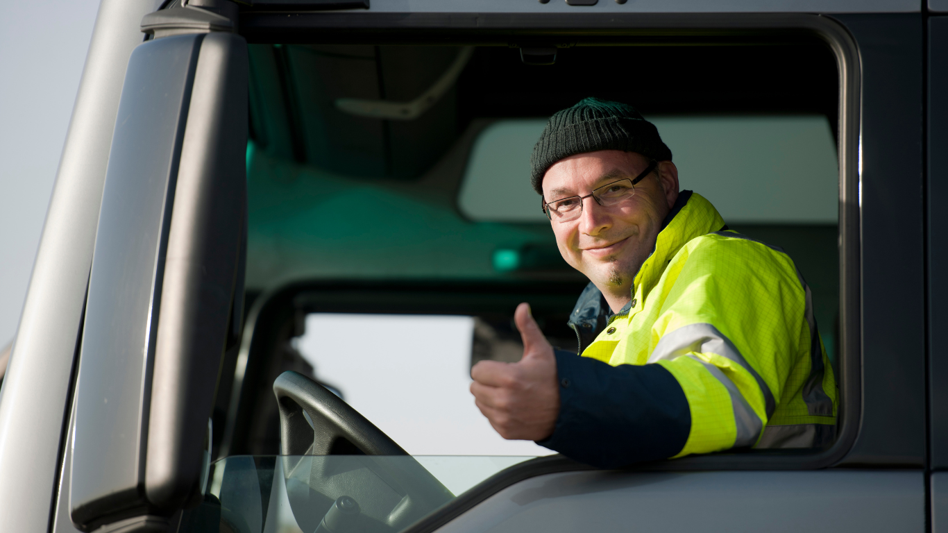 truck driver giving thumbs up out the window